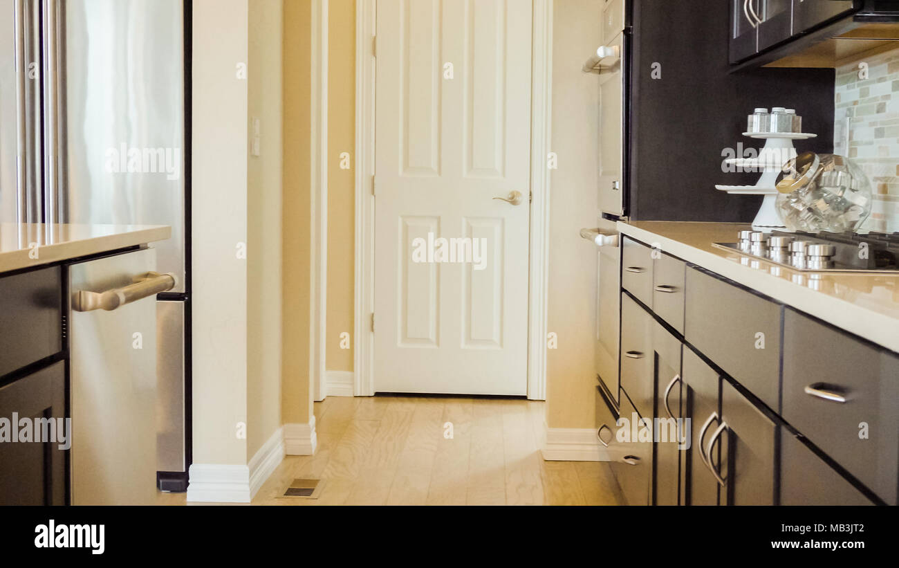 Modern kitchen in luxury house Stock Photo - Alamy