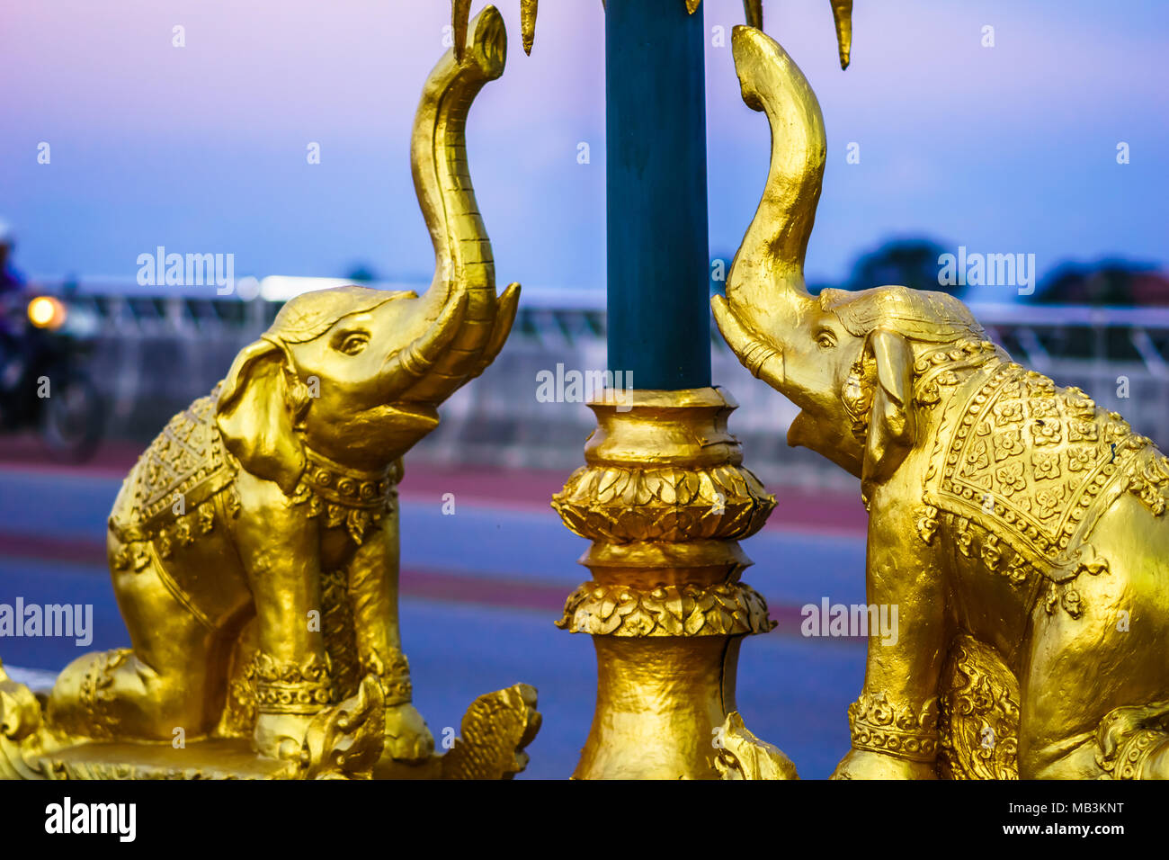 View on golden elephant statue on bridge by Chiang Rai Thailand Stock