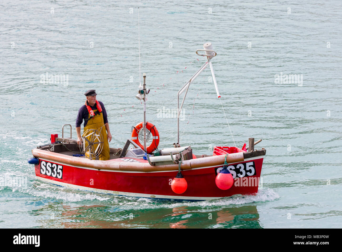 Steering a boat hi-res stock photography and images - Alamy