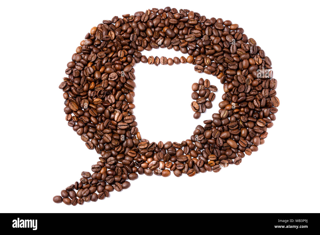 Coffee in shape of speech bubble with coffee mug inside on white background Stock Photo