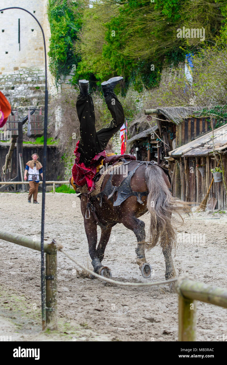 PROVINS, FRANCE - MARCH 31, 2018: Unidentified brave man rides a horse  being upside down in the medieval reconstruction of Legend of the Knights  Stock Photo - Alamy
