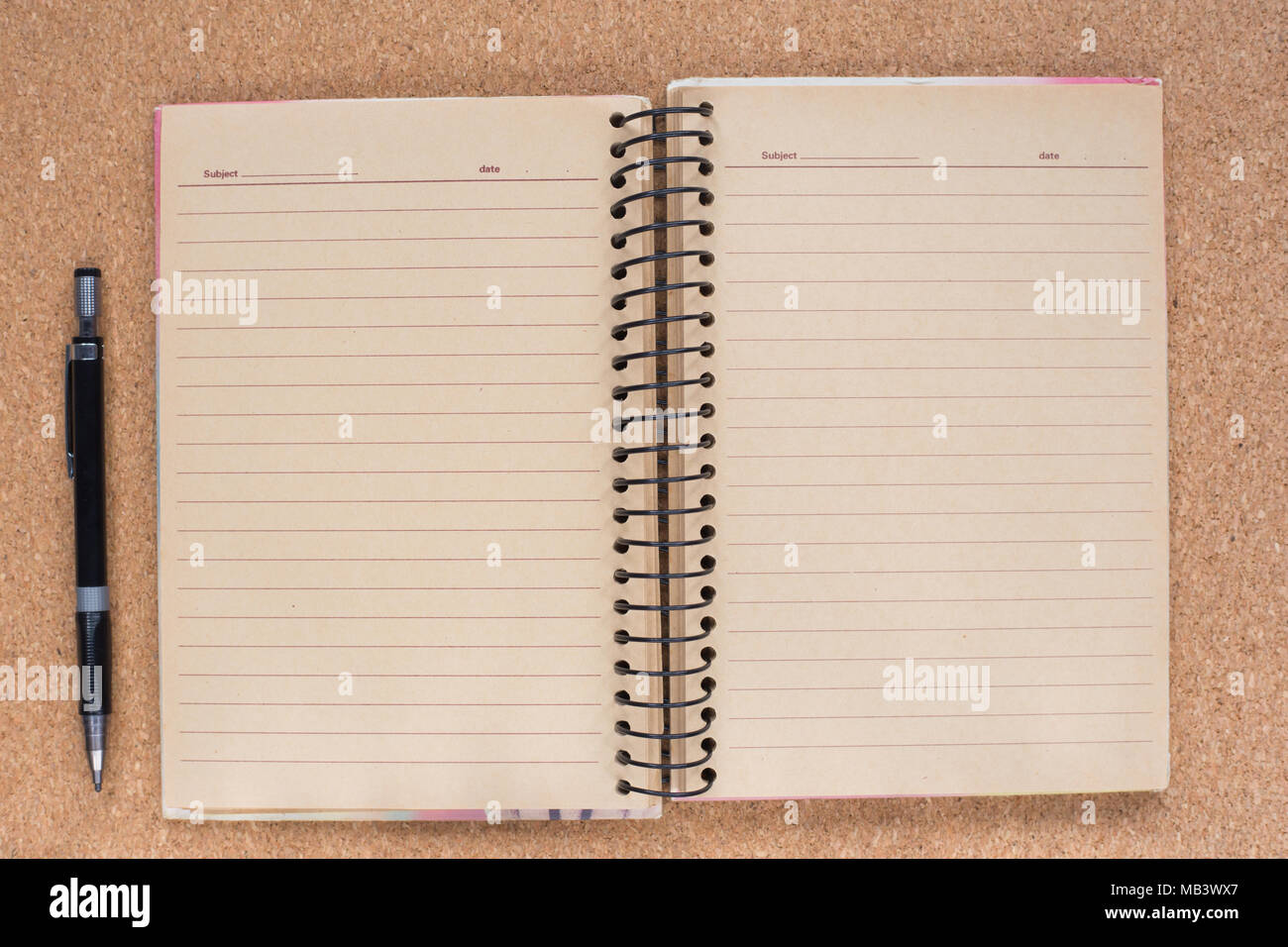 Top view notebook on wooden texture. Concept for education and 