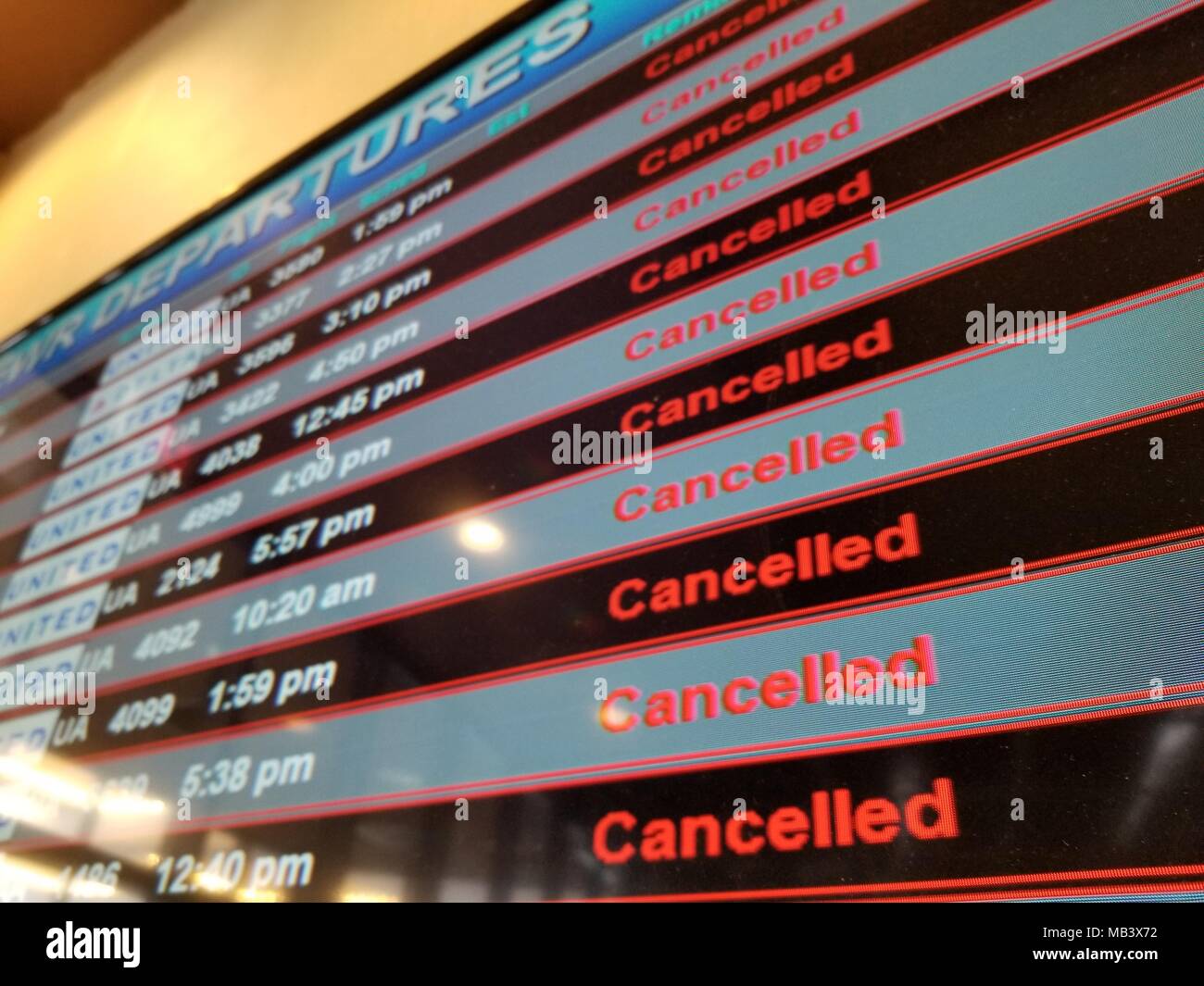 Flight departures board showing all flights canceled during a snow event at Newark International Airport, Newark, New Jersey, March 21, 2018. () Stock Photo