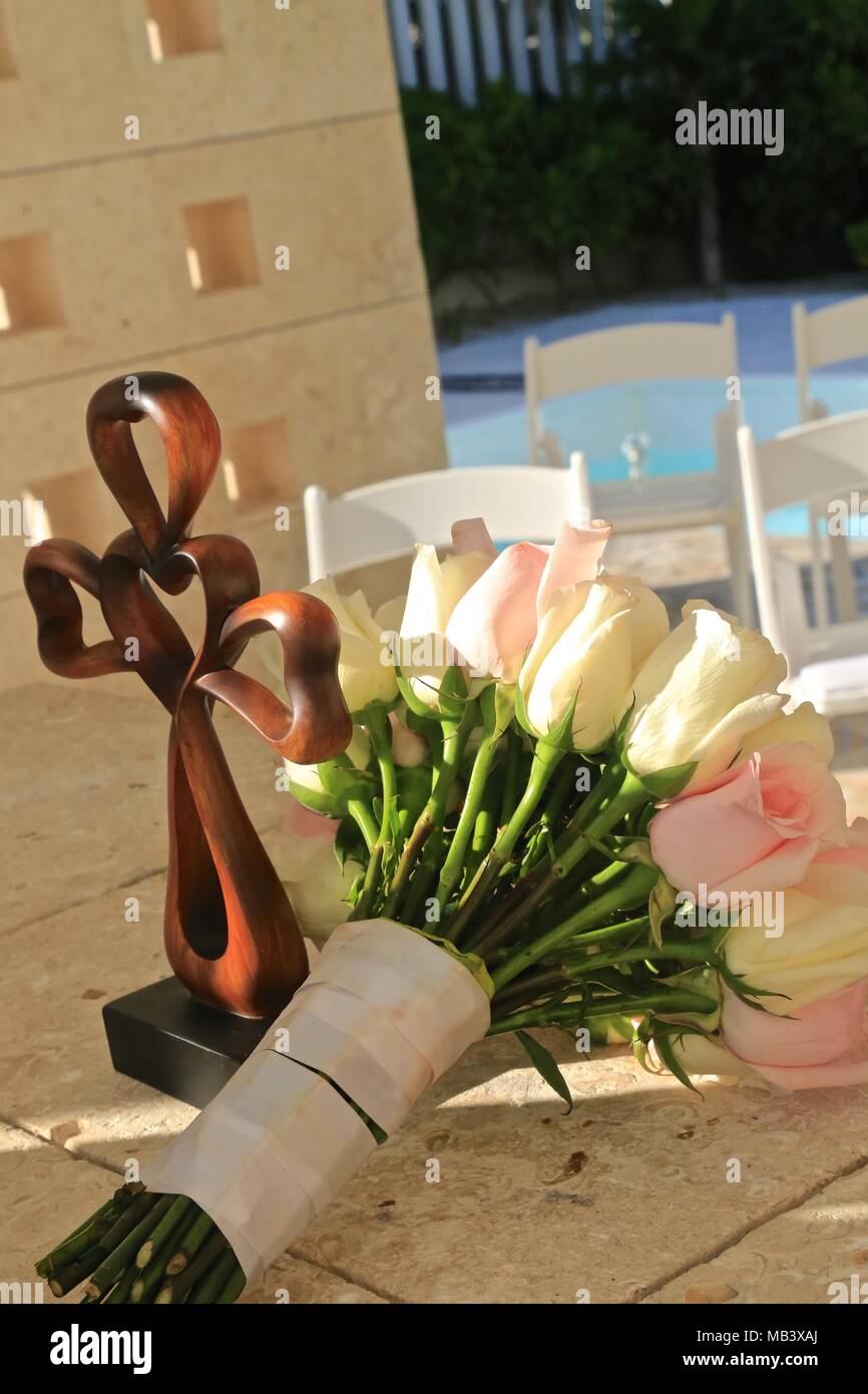 flowers and wood cross in mexico wedding Stock Photo Alamy