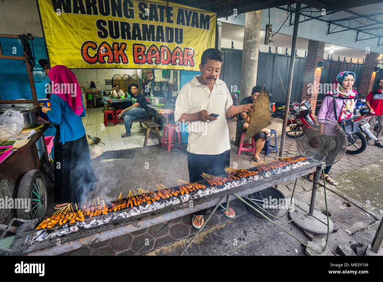 Sate Ayam Restaurant, specialized in grilled chicken skewers in Borobudor, Central Java, Indonesia Stock Photo