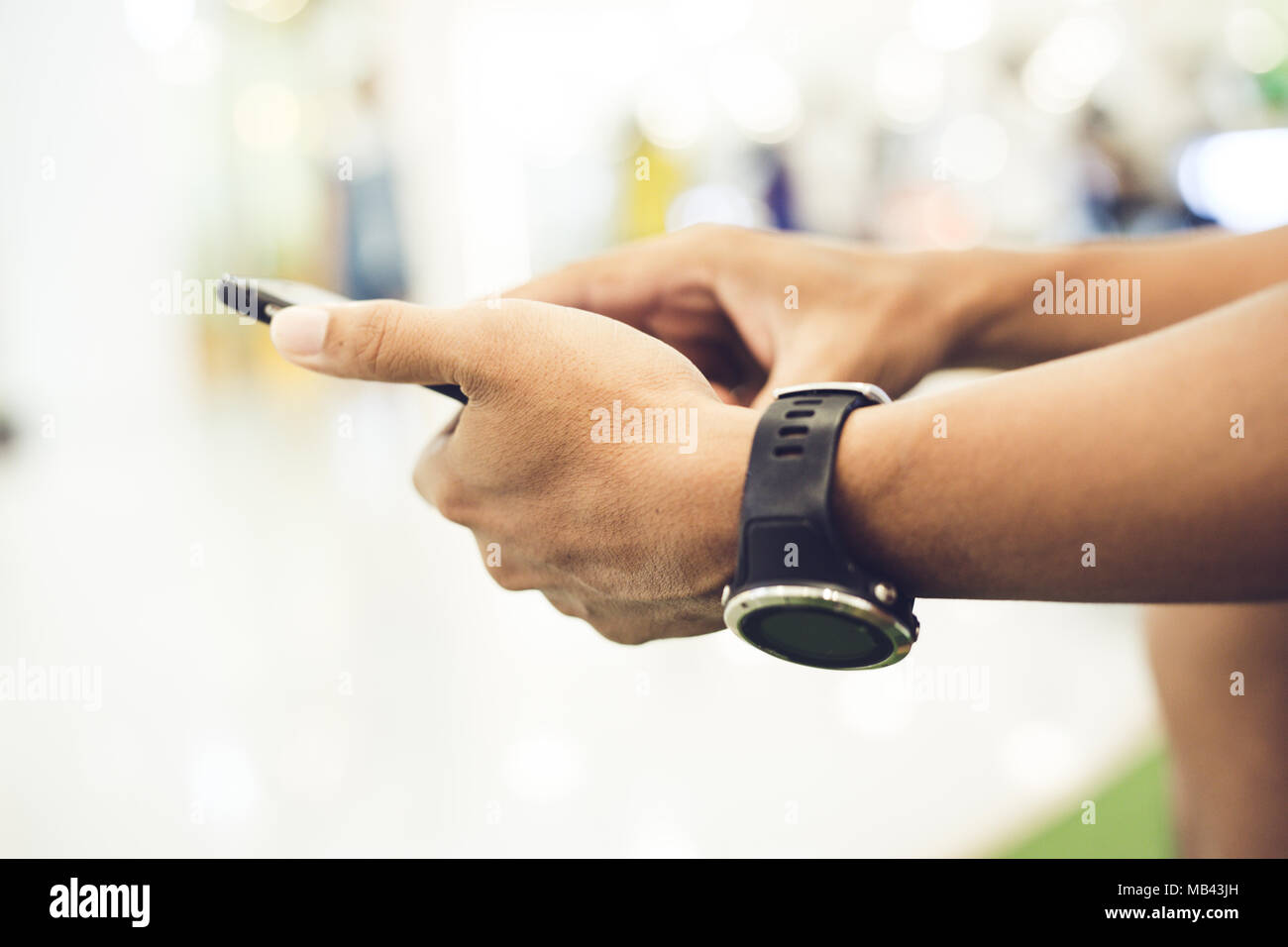 man asian using phone for celling and texting on her mobile phone Stock Photo