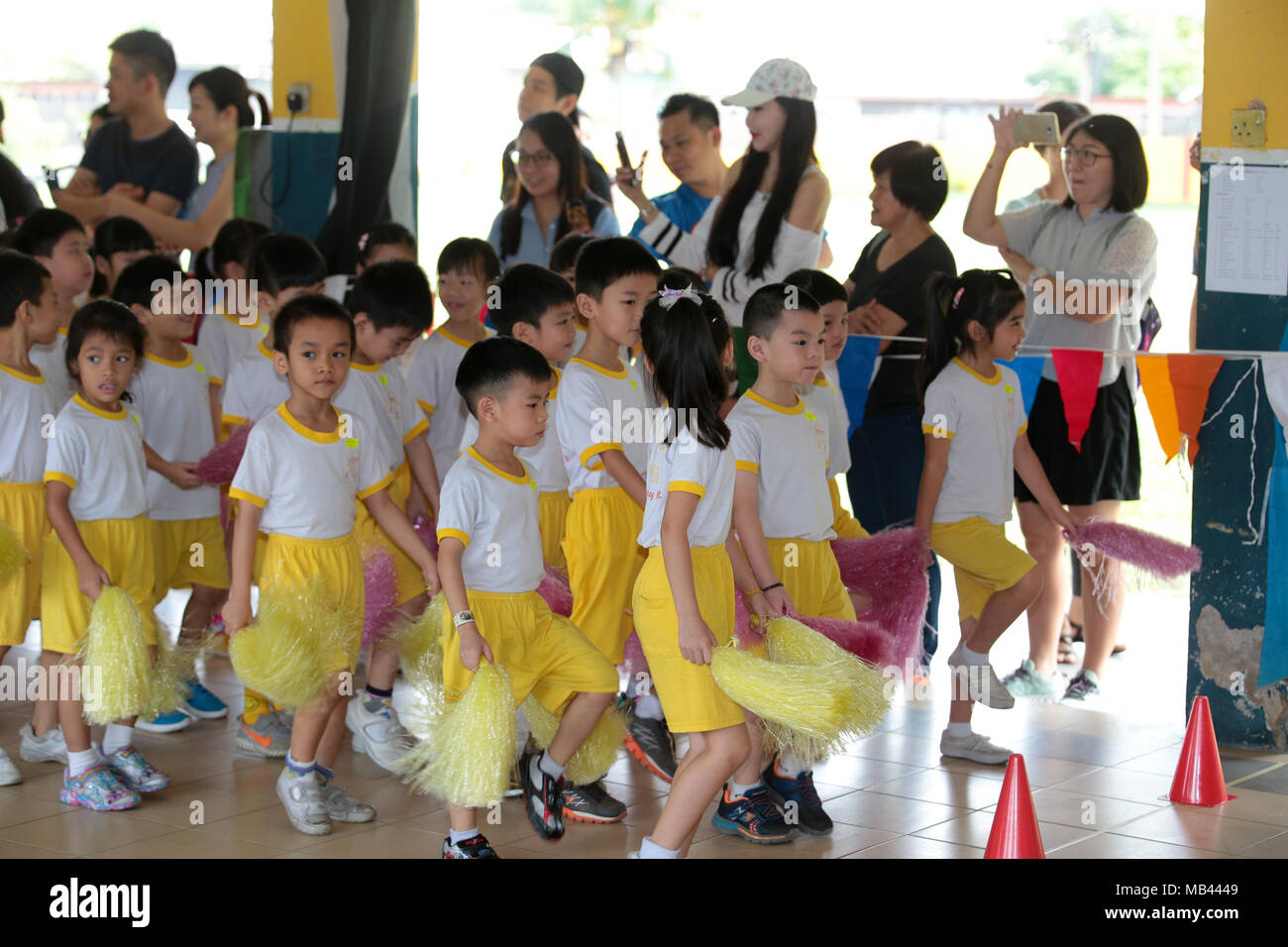 Parents and children at a kindergarten sport day activity Stock Photo Alamy