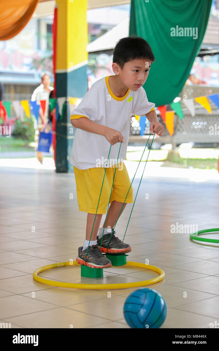 Children playing the walk the clog game at their kindergarten sport day ...