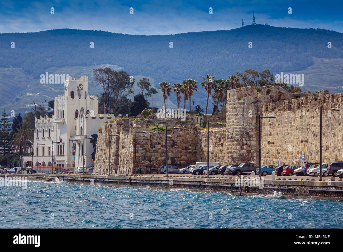 Kos Town with choppy sea. Ancient city walls and town hall, Kos Greece