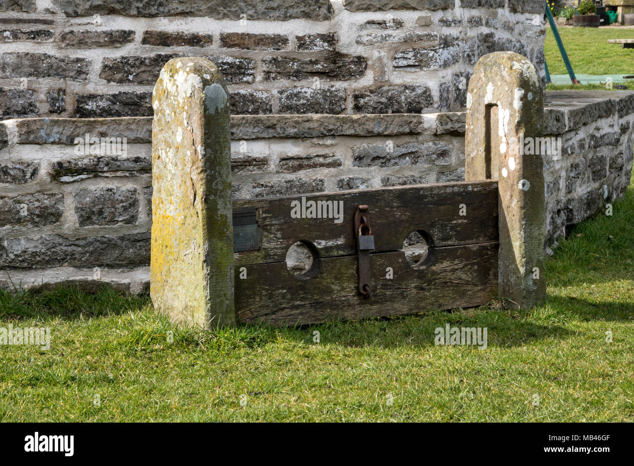village stocks at West Burton in Yorkshire Dales Stock