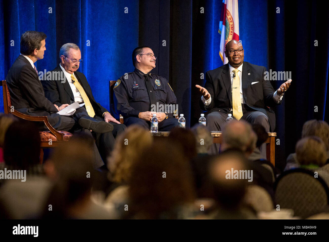 Boynton Beach, Florida, USA. 6th Apr, 2018. WPTVÃ¢â‚¬â„¢s Michael Williams moderates a discussion between Sheriff Ric Bradshaw, School District Police Chief Lawrence J. Leon and Palm Beach County Superintendent Dr. Donald E. Fennoy II, at the Forum Club luncheon at the Kravis Center Cohen Pavilion in West Palm Beach, Florida on April 6, 2018. Credit: Allen Eyestone/The Palm Beach Post/ZUMA Wire/Alamy Live News Stock Photo