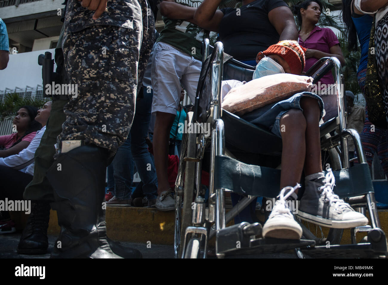 Caracas, Miranda, Venezuela. 6th Apr, 2018. A child seen on his wheelchair during the demonstration. Patients from the Dr JM de Los Rios Children's Hospital protest outside the health center demanding medical supplies and the presence of the Minister of Health. Relatives denounce lack of medicines, medical supplies and that for these reasons many children have had to discontinue their treatments. Credit: Roman Camacho/SOPA Images/ZUMA Wire/Alamy Live News Stock Photo