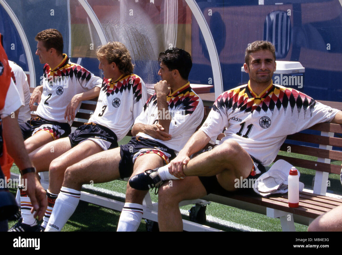 FIFA World Cup - USA 1994 10.7.1994, Giants Stadium, New York/New Jersey. World Cup Quarter Final, Bulgaria v Germany. German substitutes on the bench before the match, from left Thomas Strunz, Andreas Brehme, Karlheinz Riedle & Stefan Kuntz. Stock Photo