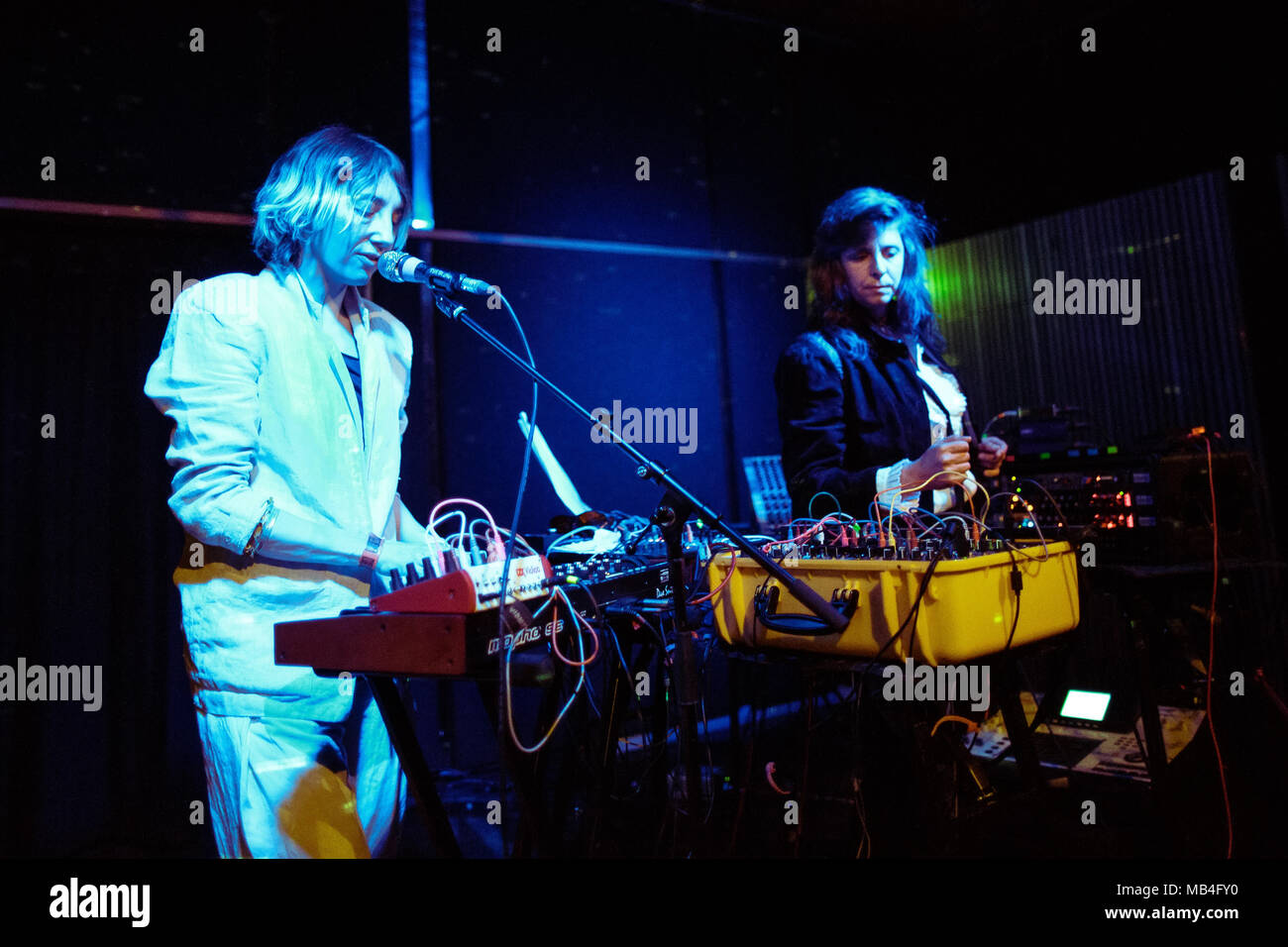 Denmark, Copenhagen - April 6, 2018. The American electro pop band The Blow  performs a live concert at Ideal Bar in Copenhagen. Here Khaela Maricich is  seen live on stage with Melissa