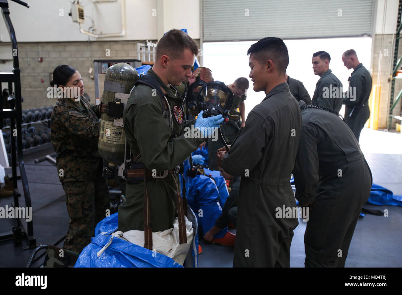 Marines with Aircraft Rescue and Firefighting (ARFF) prepare to