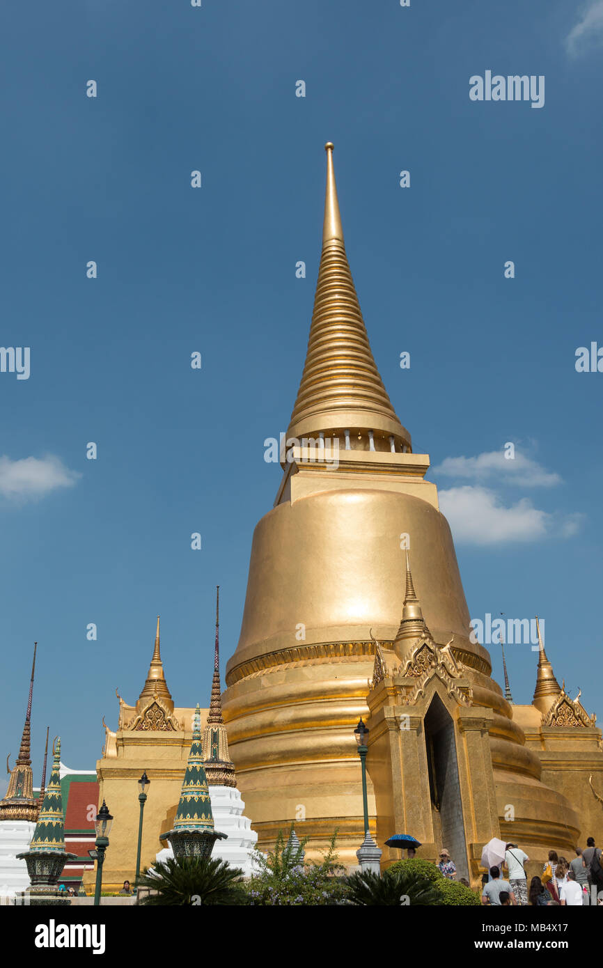 Elaborately decorated and detailed temples and stupa in the Grand Palace, Bangkok, Thailand. Stock Photo