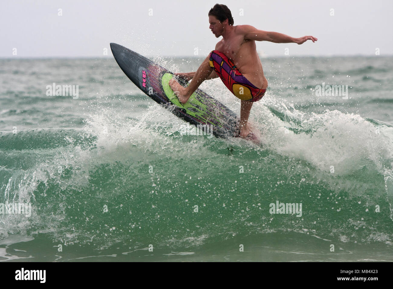 Man with sunscreen surfing hi-res stock photography and images - Alamy