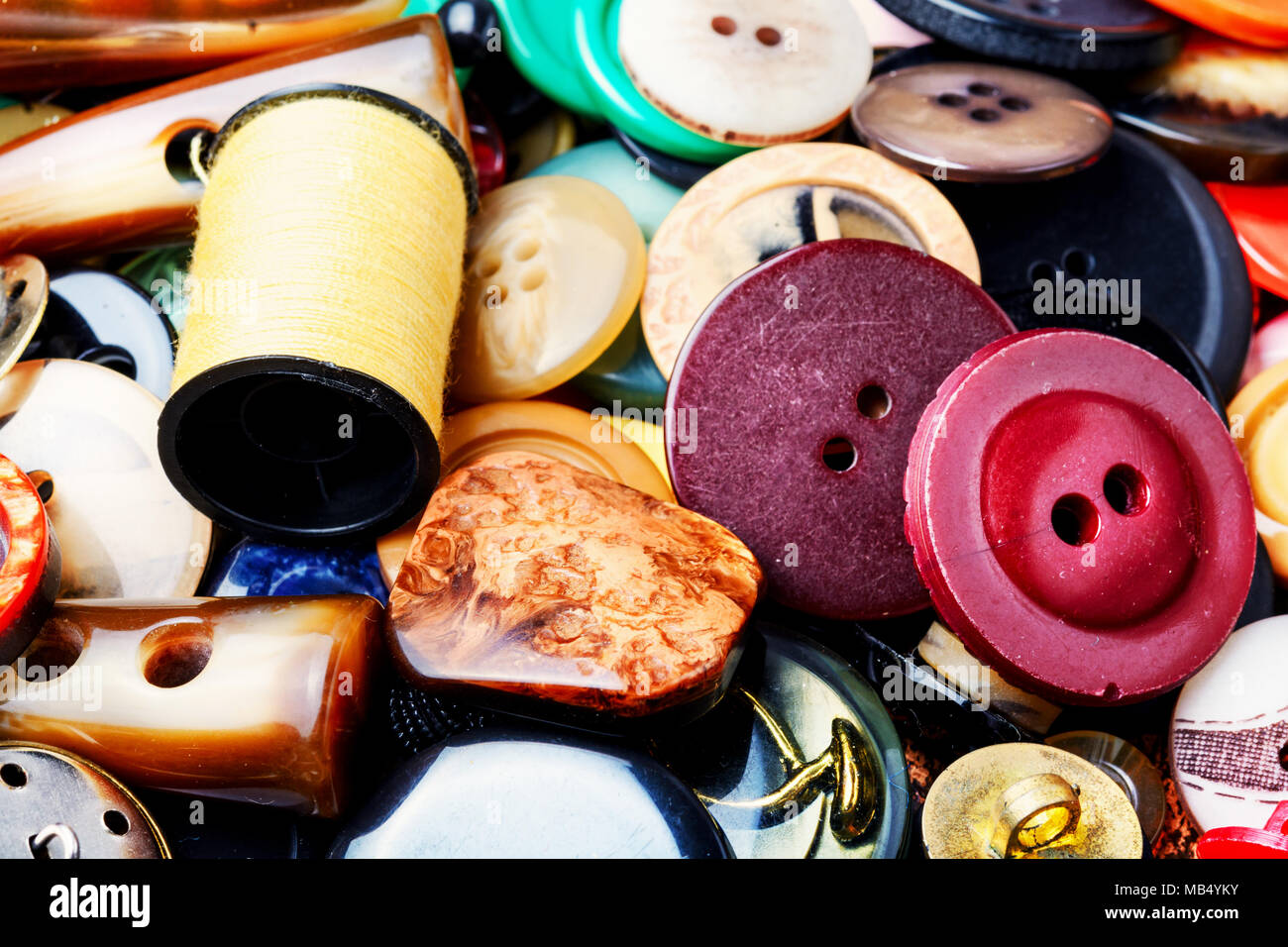 Large set of plastic buttons for clothing.Background made of buttons