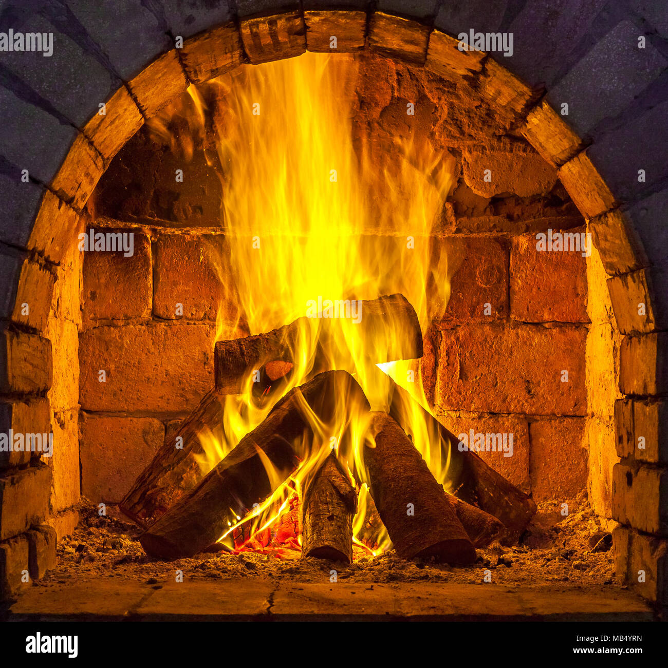 A fire burns in a fireplace Stock Photo - Alamy
