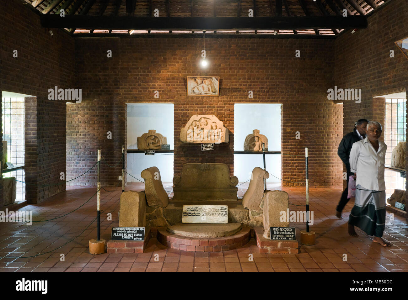 Horizontal view of ancient exhibits in Isurumuniya Viharaya museum in Anuradhapura, Sri Lanka. Stock Photo