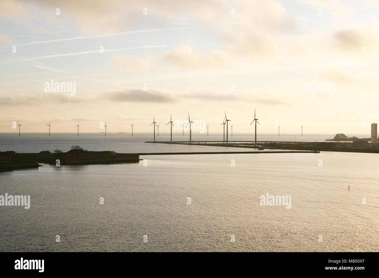Windmills at dawn offshore Copenhagen, Denmark Stock Photo