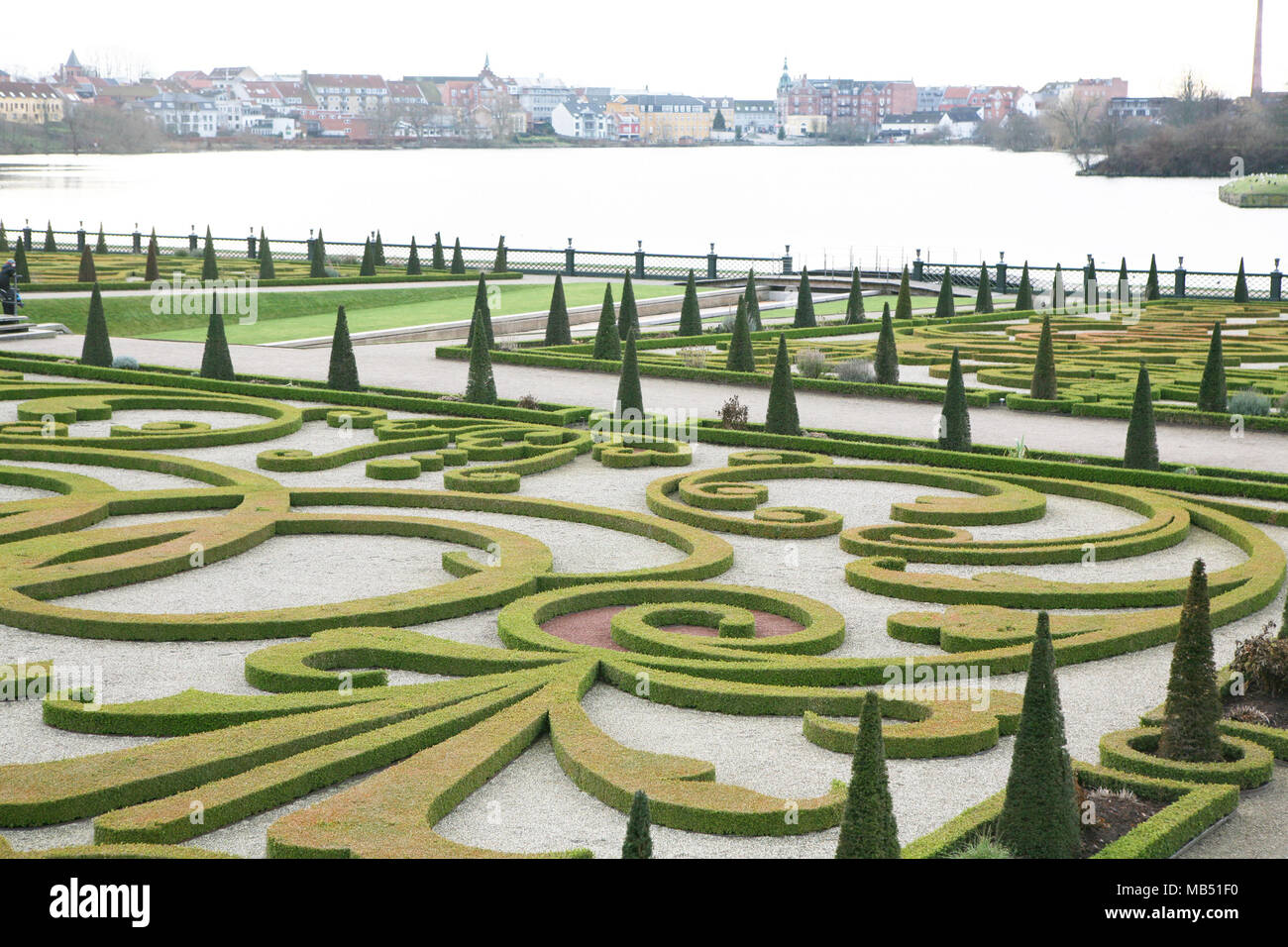 Formal garden at Hillerod castle and view of the city, Denmark Stock Photo