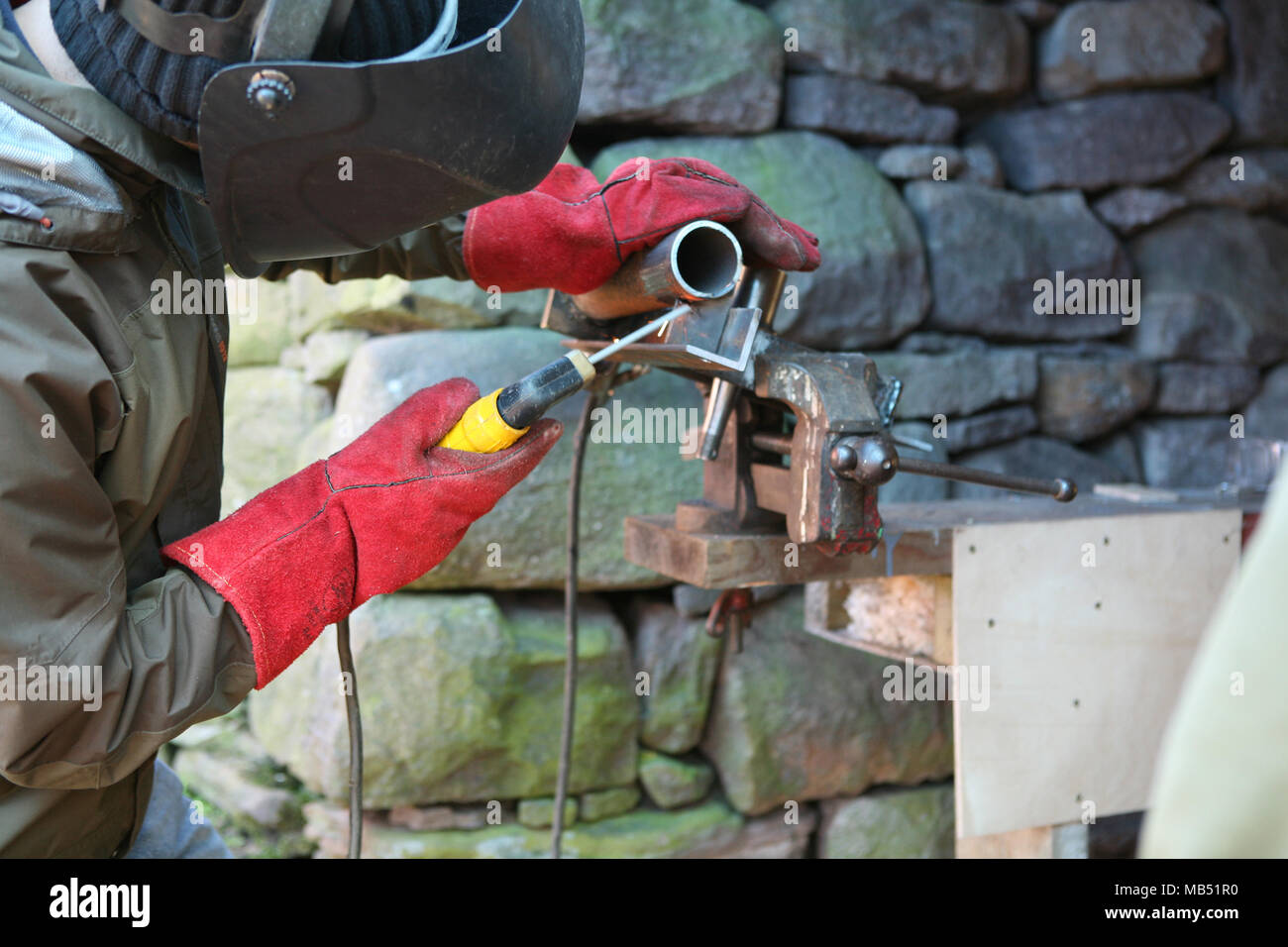 Man welding iron Stock Photo