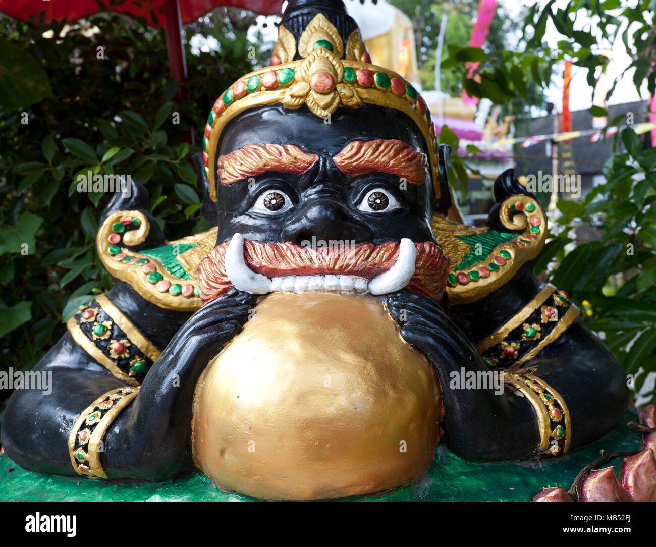 Buddhist statue of the giant Rahuomchan in the temple Wat Pha Pong, Chiang Mai, Thailand Stock Photo