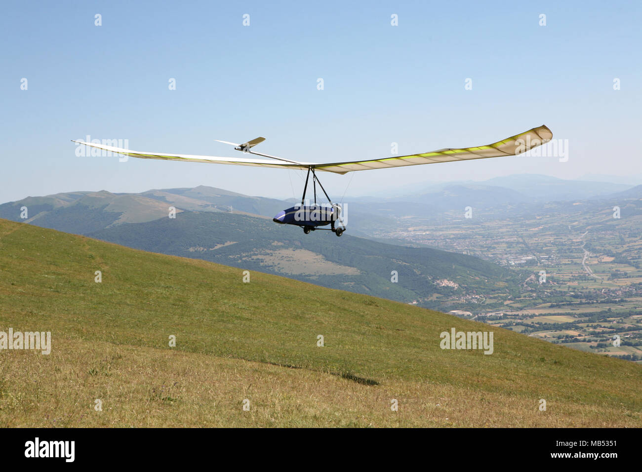 Hang glider taking off Stock Photo