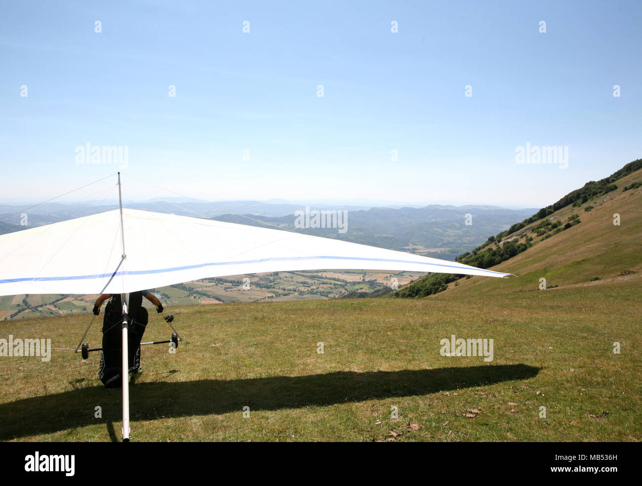Hang glider taking off Stock Photo