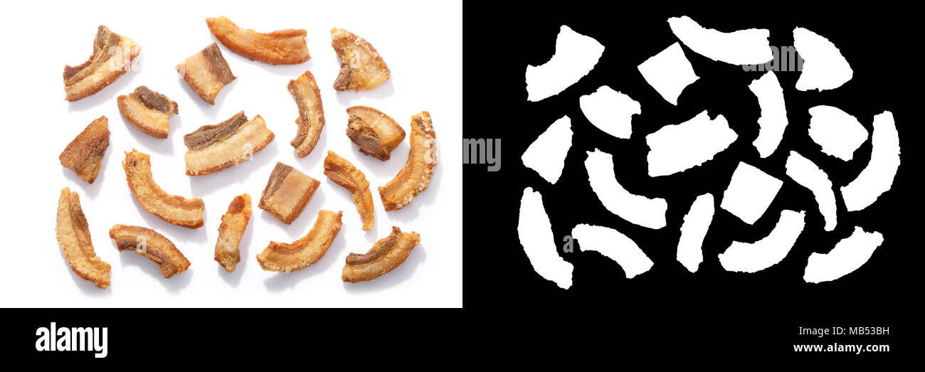 Pork rinds or chicharron, greaves, scratchings or torresmo snack, top view. Alpha channel, shadows separated Stock Photo