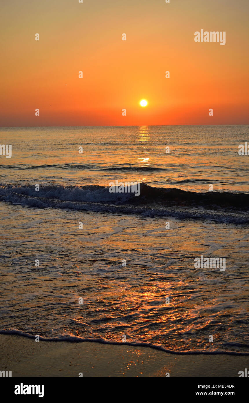 Foamy sea waves during sunset hi-res stock photography and images - Alamy