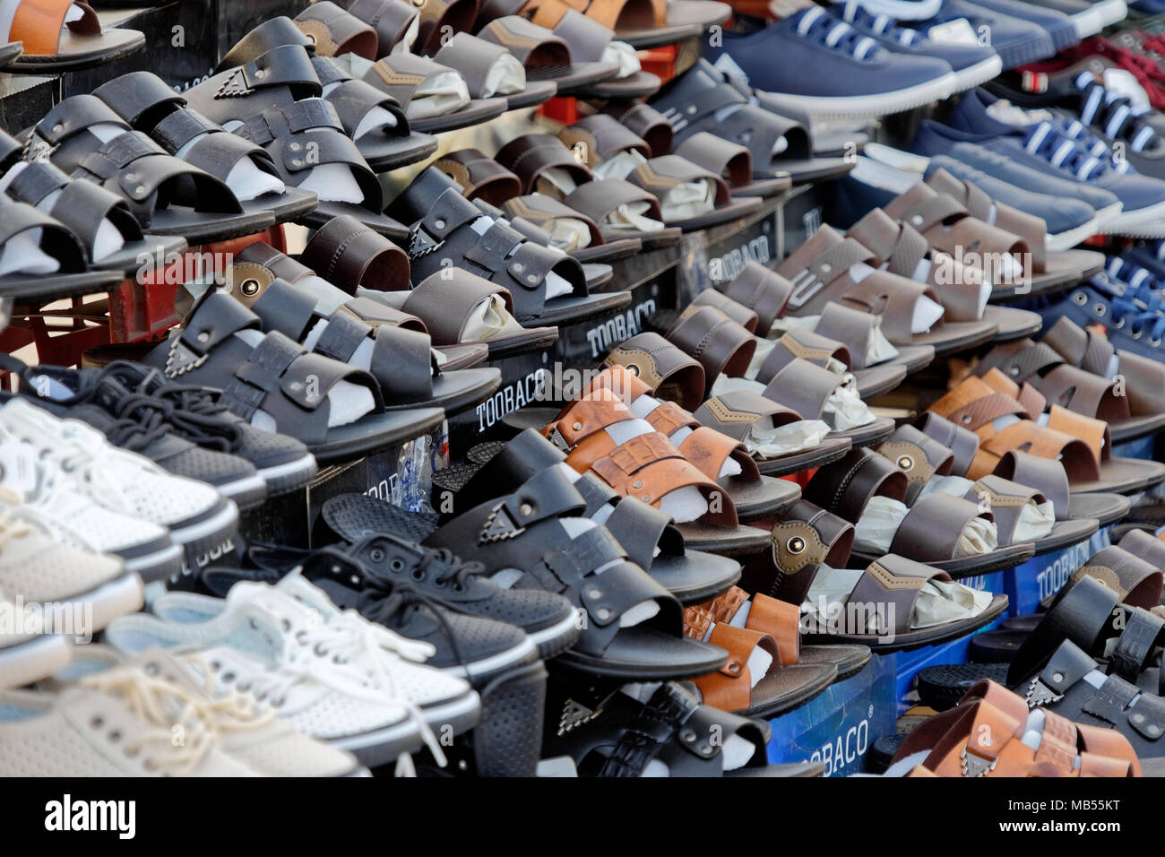 Aqaba, Jordan, March 8,2018: Market stall in the city center with many  shoes and sandals for sale to locals and tourists, middle east Stock Photo  - Alamy