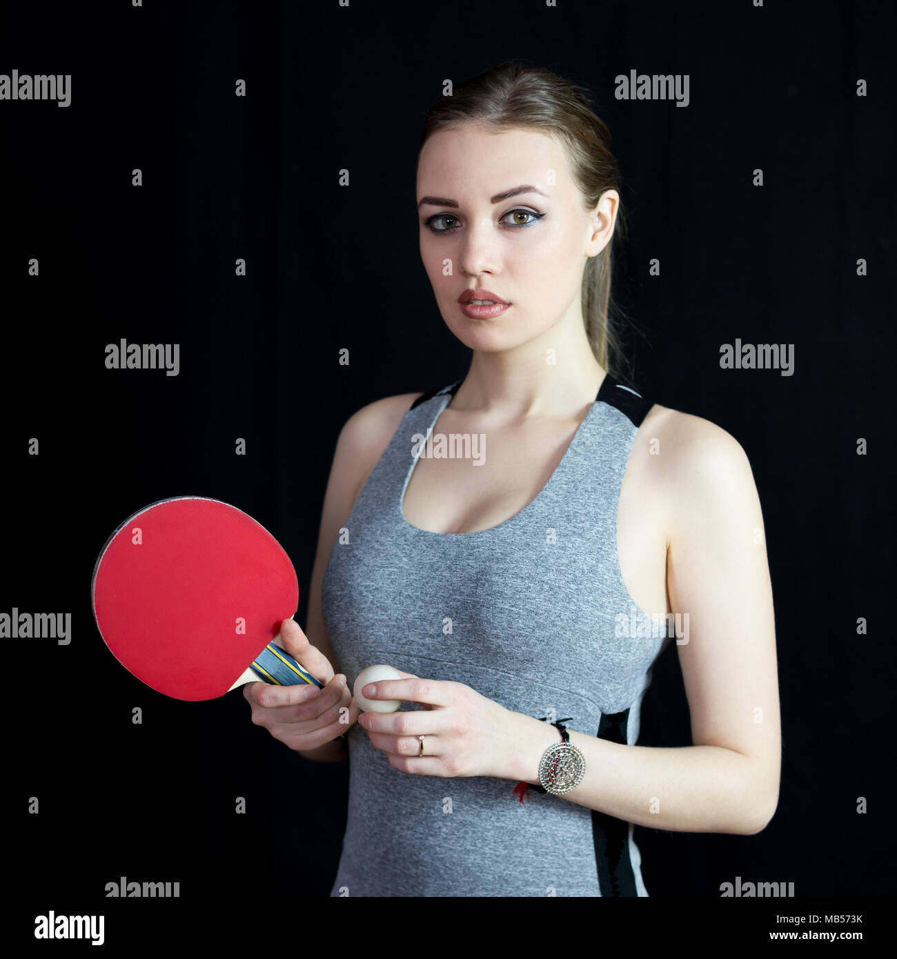 The athlete is holding a table tennis racket and a ball Stock Photo Alamy