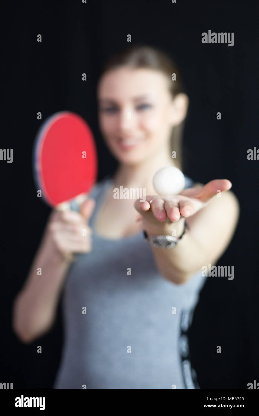 The athlete is holding a table tennis racket and a ball Stock Photo Alamy