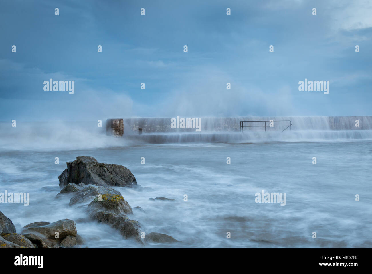Storm Break - Storm Waves Breaking Over The Harbour Wall Stock Photo