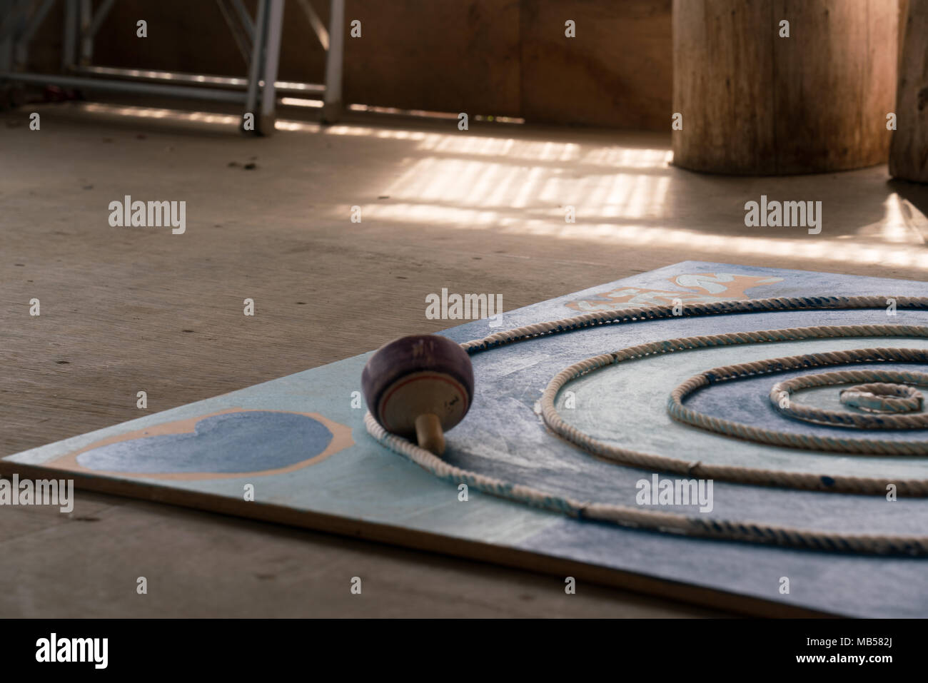 In Japan, spinning tops are believed to bring good luck and prosperity. Using abundant timber Oyama craftsmen have been turning them since Edo period. Stock Photo