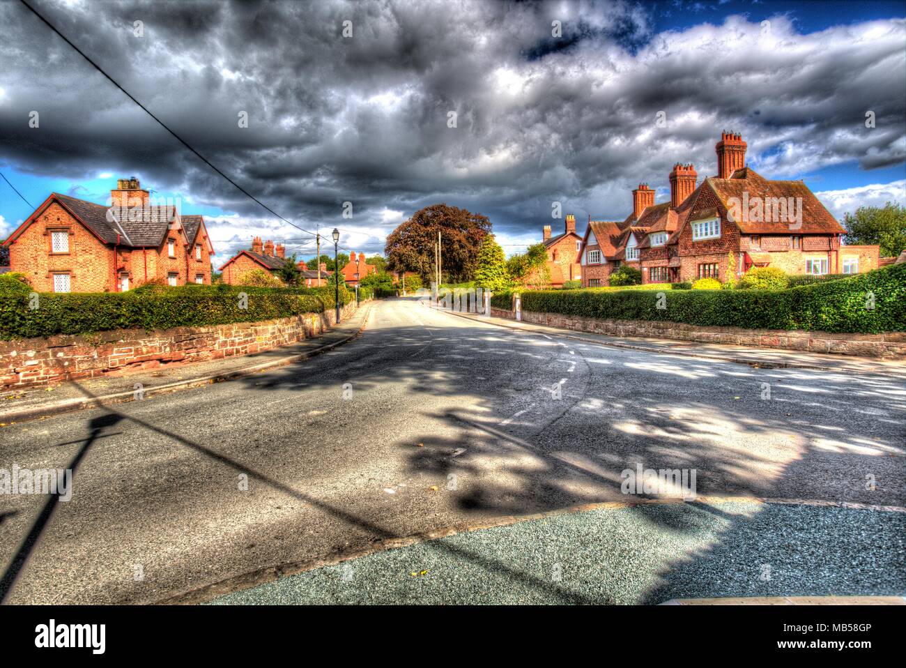 Village of Saighton, Cheshire, England. Artistic spring view of Saighton’s main thoroughfare. Stock Photo