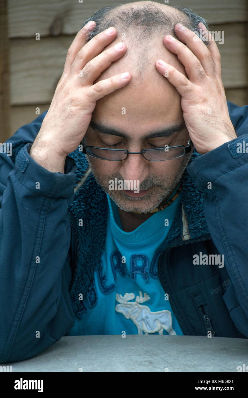 depressed man thinks there is no way out Stock Photo