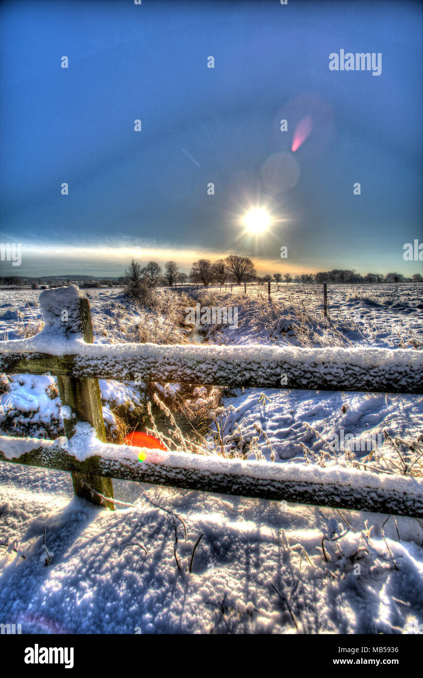 Village of Coddington, England. Artistic winter view over a pasture