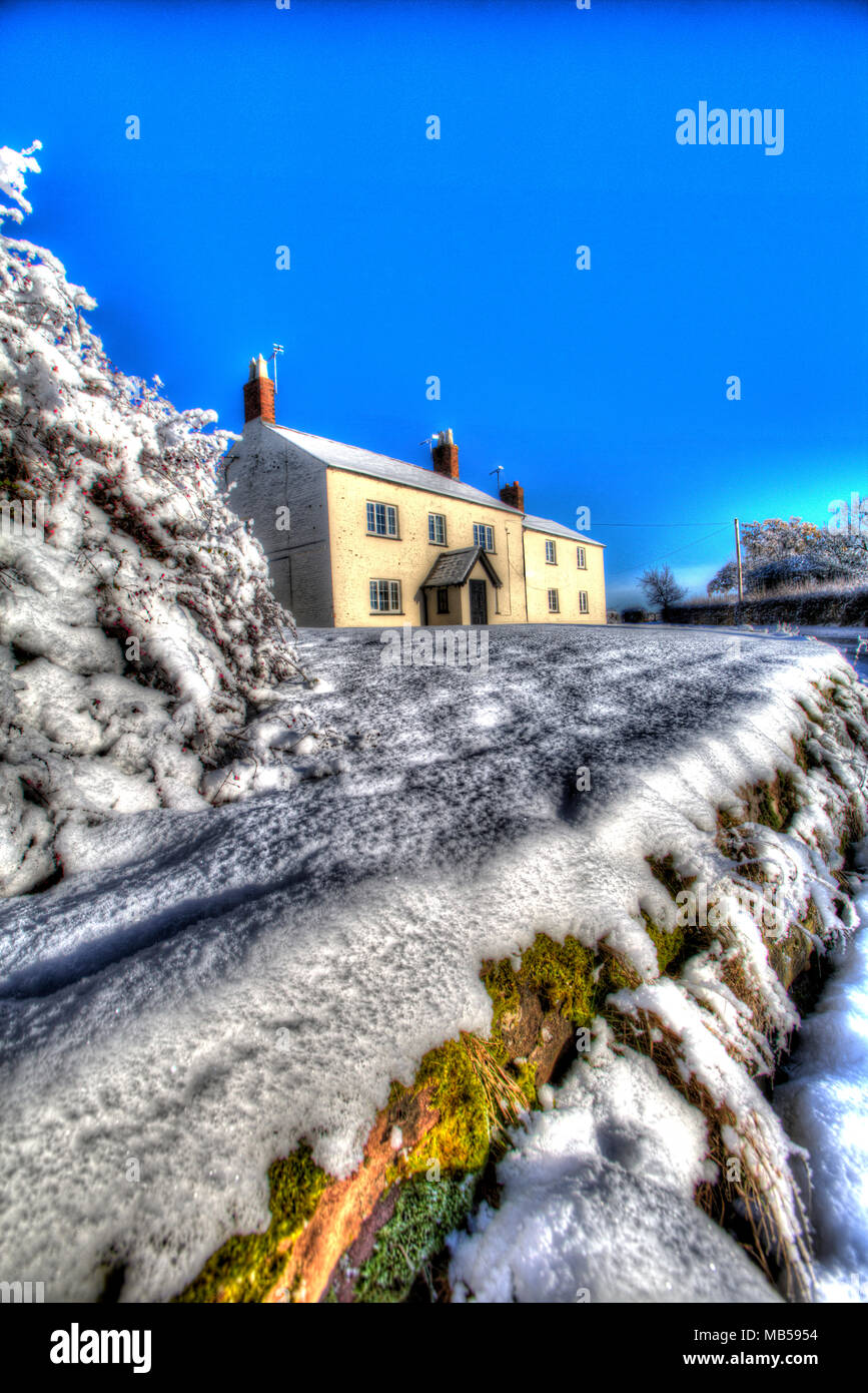 Village of Coddington, England. Artistic winter view of a rural house, in the Cheshire village of Coddington. Stock Photo