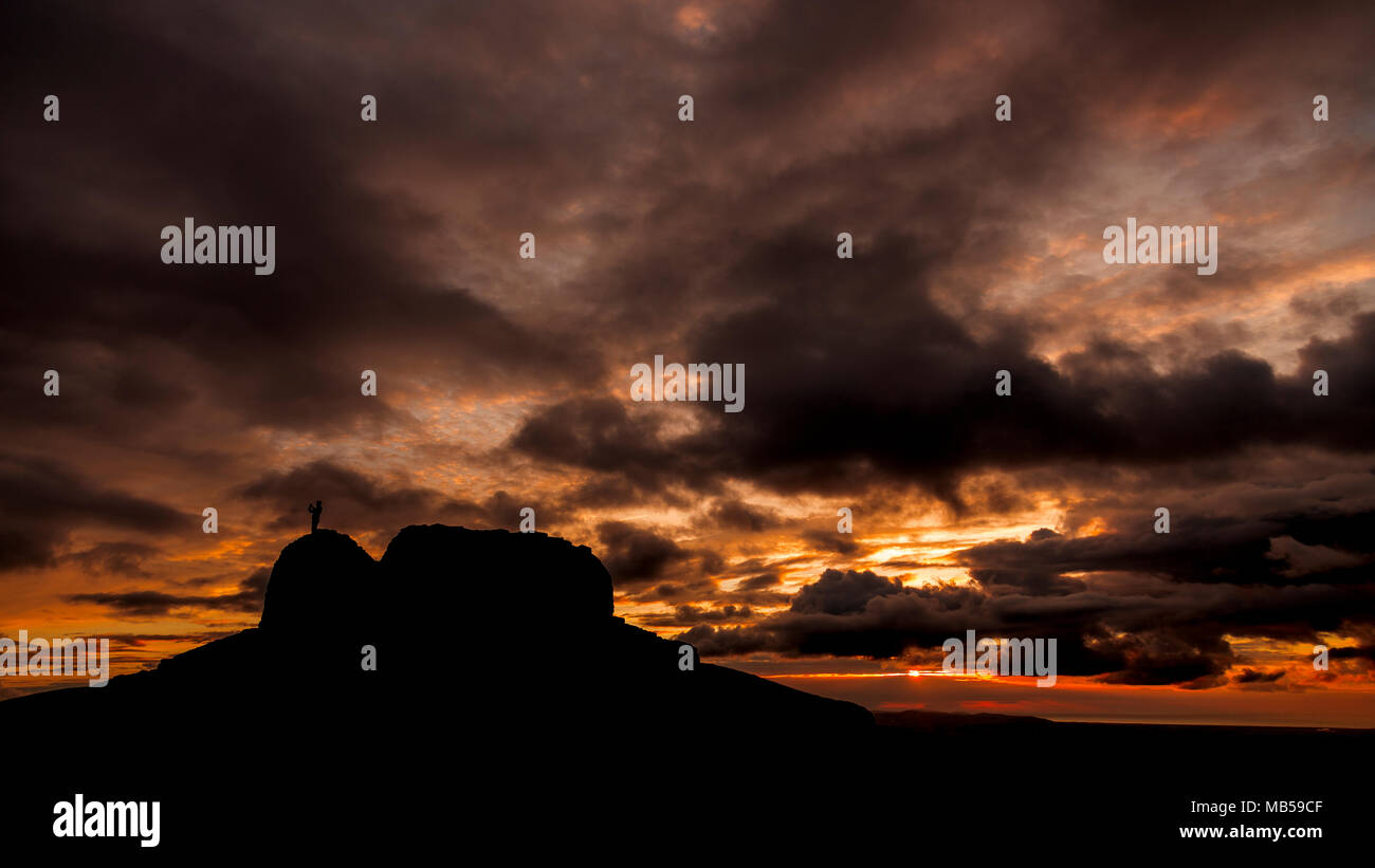 Jubilee Tower with dramatic clouds at sunset on the summit of Moel Famau, North Wales Stock Photo