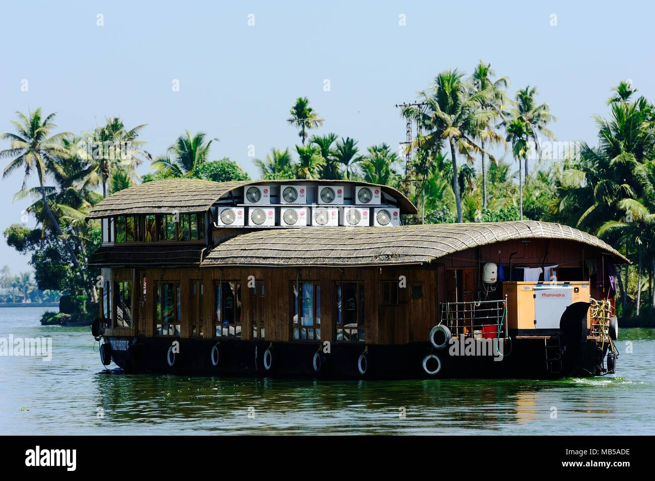 Cochin, India - January 2017:Tourists on a river boat on the backwaters of Kochin Stock Photo