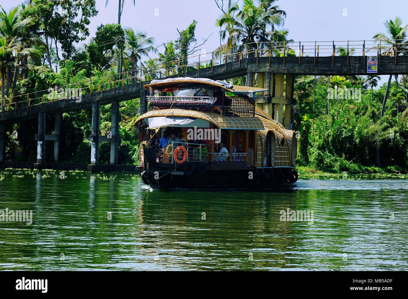 Cochin, India - January 2017:Tourists on a river boat on the backwaters of Kochin Stock Photo