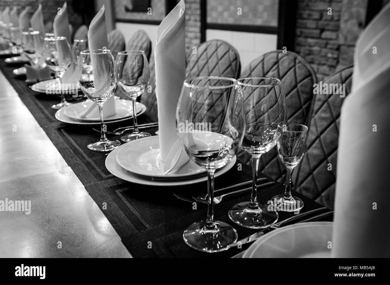 Table setting in restaurant. Black and white photography Stock Photo