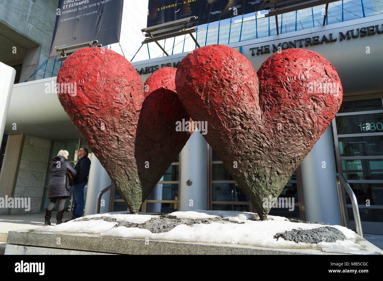 Twin 6′ Hearts, a burnished bronze sculpture by American pop artist Jim Dine, installed outside Montreal Museum of Fine Arts. Stock Photo