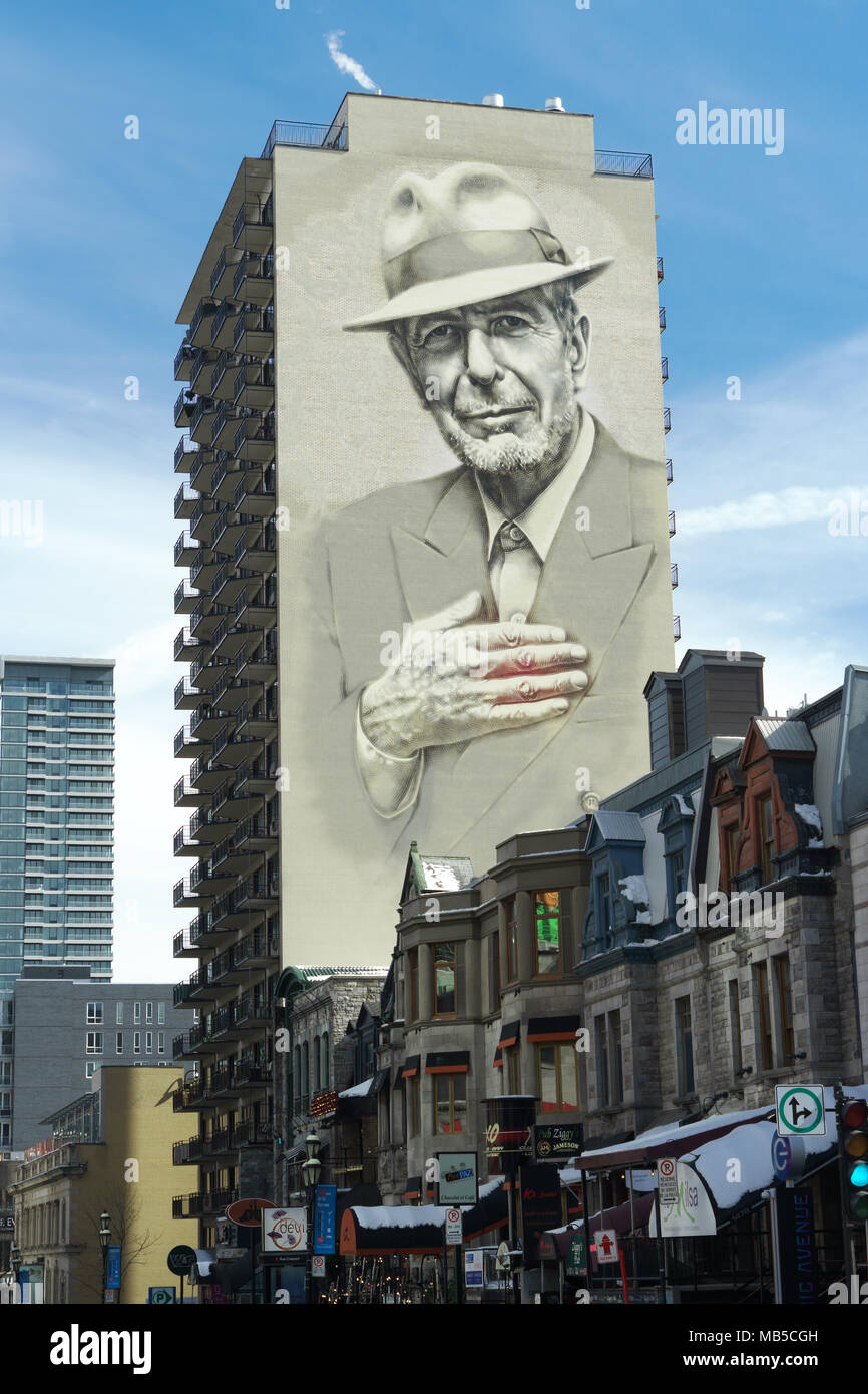 Giant mural representing Leonard Cohen, famous Canadian singer-songwriter and Montrealer, painted on a residential building in downtown Montreal. Stock Photo