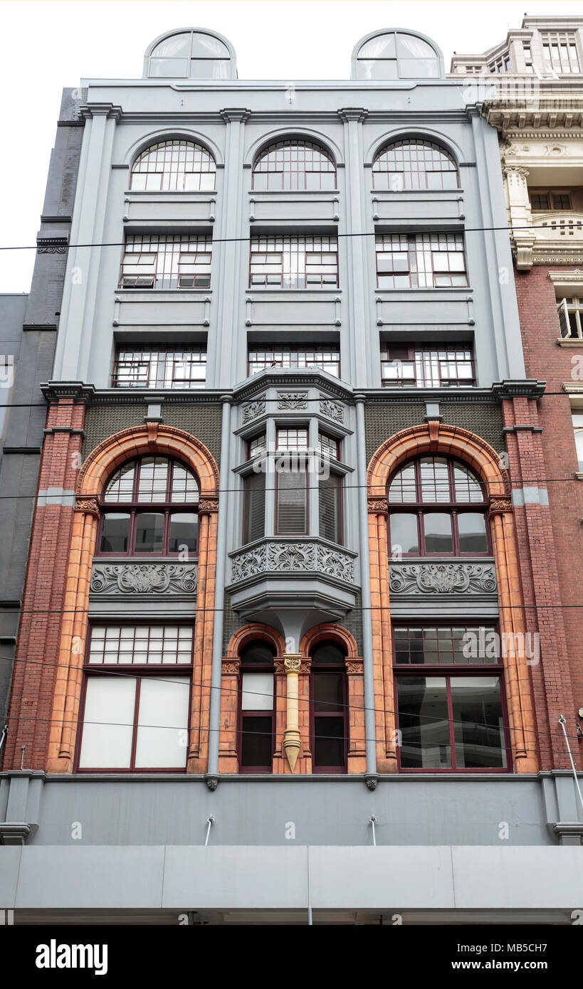 Old buildings from the twentieth century with retail shops in central