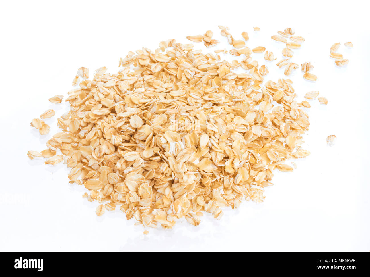 Oat flakes isolated on white background. Top view. Close up. Stock Photo
