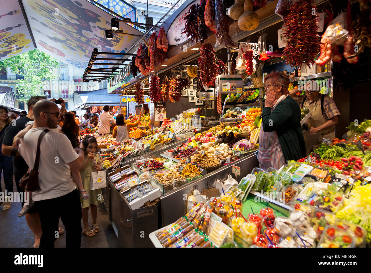 Herbs, spices, fruit and vegetable stalls at La Boqueria Market in
